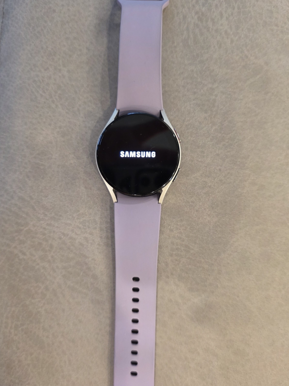 Samsung Smartwatch with Light Purple Silicone Band and Silver Case